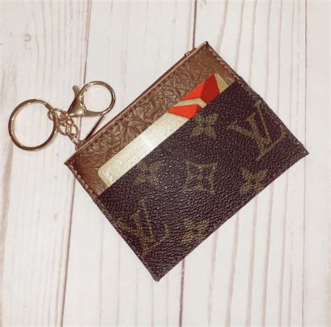 louis vuitton keychain wallet fake|authenticate louis vuitton wallet.